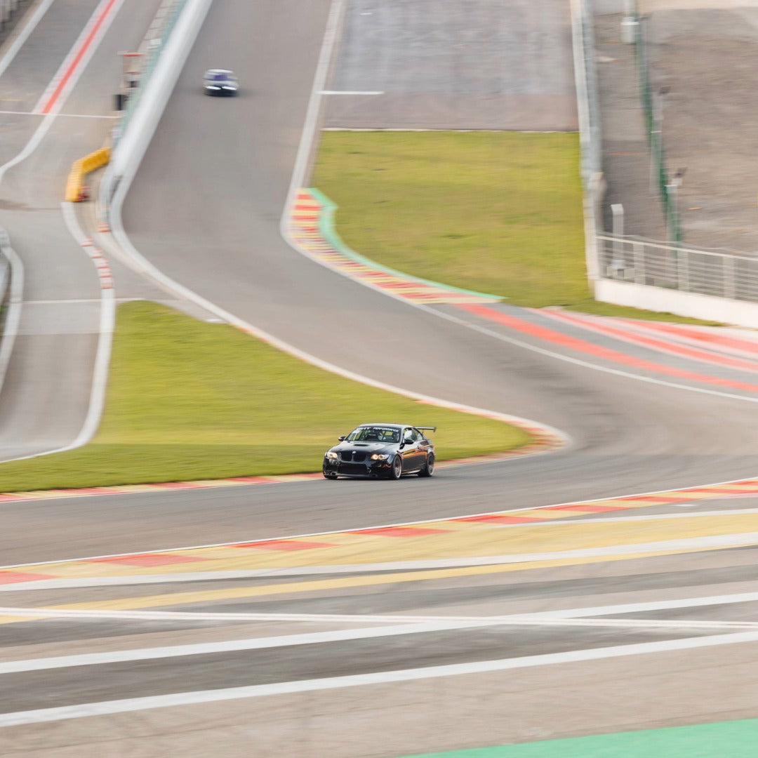 BMW E92 M3 going through Eau Rouge during a GP Days Open Pitlane Track Day at Spa Francorchamps